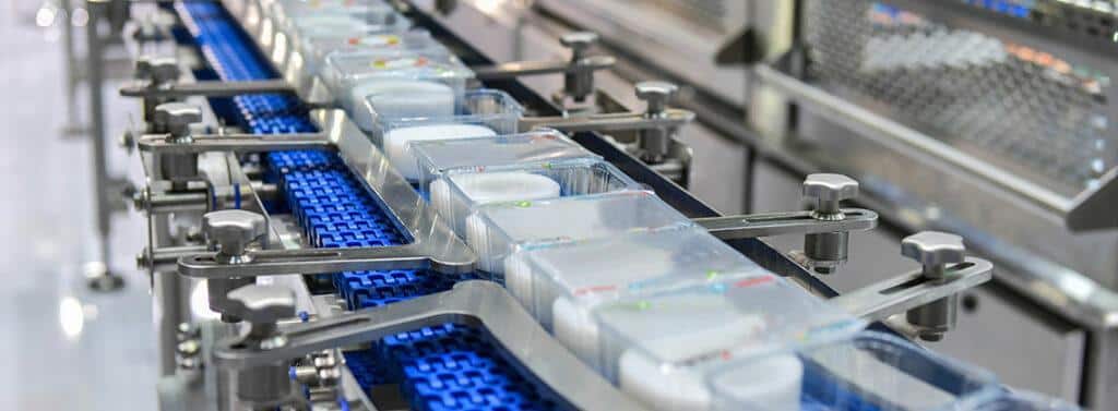 Pathogen decontamination of food products on automated processing line